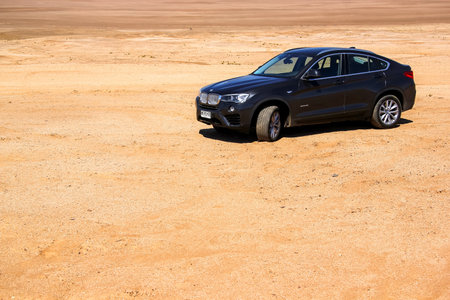 ATACAMA, CHILE - NOVEMBER 14, 2015: Luxury motor car BMW F26 X4 in the Atacama desert.のeditorial素材