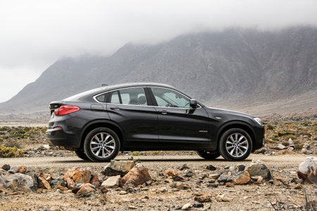 ATACAMA, CHILE - NOVEMBER 14, 2015: New black crossover BMW F26 X4 at the stone desert.のeditorial素材