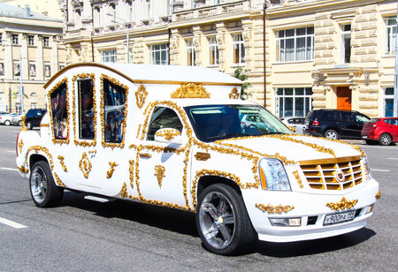 MOSCOW, RUSSIA - JUNE 2, 2013: Wedding limousine Cadillac Escalade at the city street.のeditorial素材
