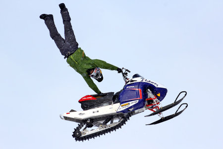NOVYY URENGOY, RUSSIA - APRIL 6: Anders Ericsson performes a trick at the annual Russian Snocross Championship on April 6, 2013 in Novyy Urengoy, Russia.のeditorial素材