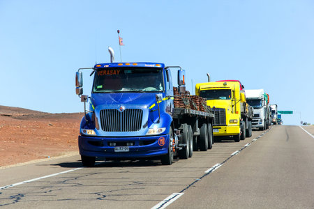 ATACAMA, CHILE - NOVEMBER 18, 2015: Blue semi-trailer truck International TranStar at the interurban freeway throught the Atacama Desert (Ruta del Desierto).のeditorial素材