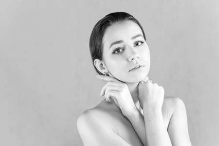 Black and white portrait of a young womanの写真素材