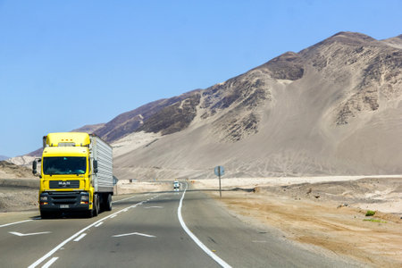 ATACAMA, CHILE - NOVEMBER 14, 2015: Semi-trailer truck MAN TGA at the road through the Atacama...