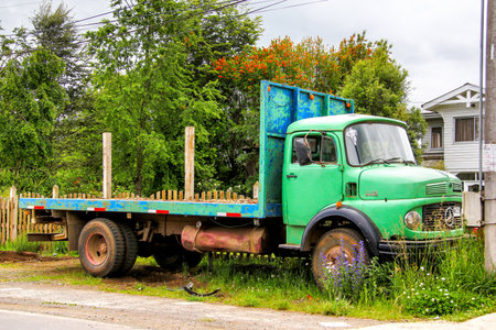 CHERQUENCO, CHILE - NOVEMBER 22, 2015: Agricultural truck Mercedes-Benz L 1113 in the town street.のeditorial素材