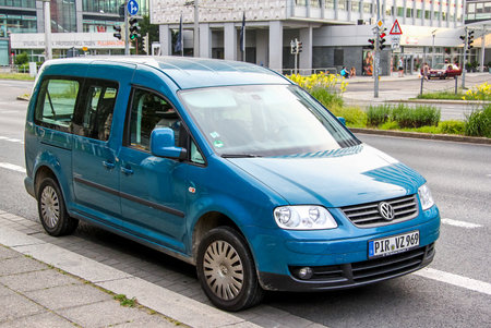 DRESDEN, GERMANY - JULY 20, 2014: Motor car Volkswagen Caddy in the city street.のeditorial素材