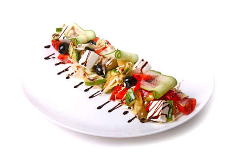 Salad of fresh vegetables isolated over white backgroundの写真素材