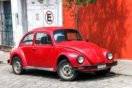 OAXACA, MEXICO - MAY 25, 2017: Red classic vintage car Volkswagen Beetle in the city street.のeditorial素材
