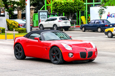 ACAPULCO, MEXICO - MAY 30, 2017: Sports car Pontiac Solstice in the city street.のeditorial素材