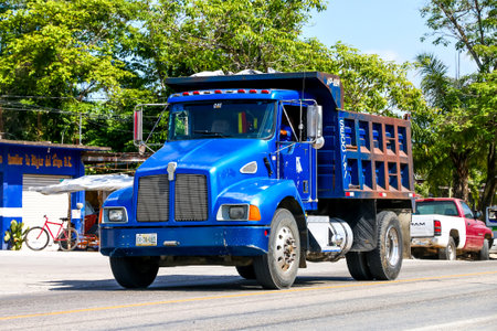 PALENQUE, MEXICO - MAY 22, 2017: Dump truck Kenworth T300 in the town street.のeditorial素材