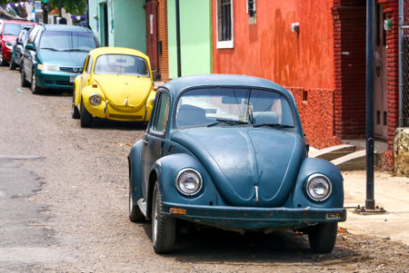 OAXACA, MEXICO - MAY 25, 2017: Motor cars Volkswagen Beetle in the city street.のeditorial素材