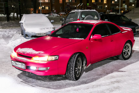 Novyy Urengoy, Russia - December 20, 2017: Pink motor car Toyota Curren in the city street.のeditorial素材