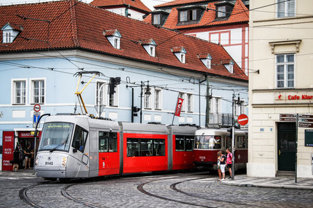 Prague, Czech Republic - July 21, 2014: Modern articulated tramway Skoda 14T Elektra in the old city street.のeditorial素材
