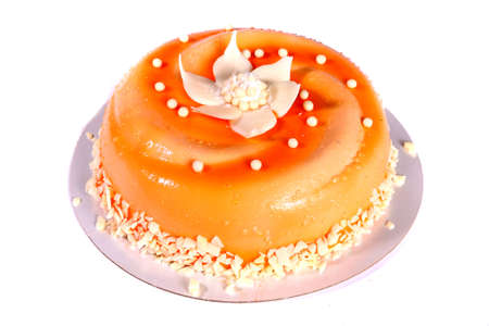 Big orange cake isolated over white backgroundの写真素材