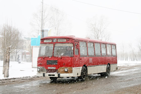 Neftekamsk, Russia - April 21, 2009: Old bus Liaz 677M in the city street.のeditorial素材