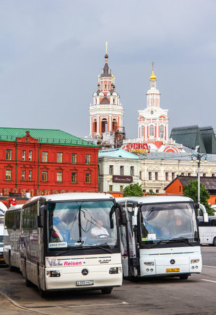 Moscow, Russia - June 2, 2013: Touristic coach buses Mercedes-Benz Turk O350RHD Tourismo in the city street.のeditorial素材