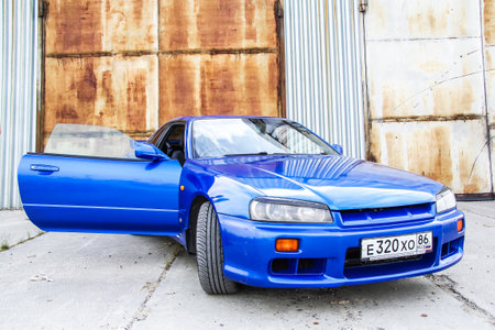 Novyy Urengoy, Russia - July 6, 2014: Motor car Nissan Skyline in the city street.のeditorial素材