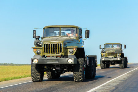 Bashkortostan, Russia - August 19, 2011: Brand new army chassis trucks Ural 4320 at the interurban road.のeditorial素材