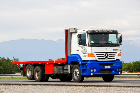 O'Higgins, Chile - November 19, 2015: Flatbed truck Mercedes-Benz 1938S at the interurban freeway.のeditorial素材