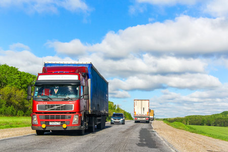 Tatarstan, Russia - May 21, 2013: Semi-trailer truck Volvo FM12 at the interurban road.のeditorial素材