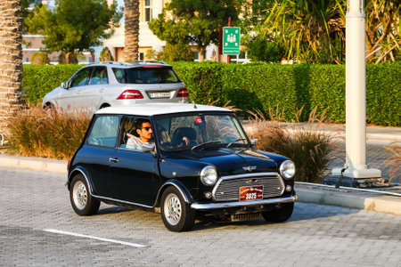 Dubai, UAE - November 18, 2018: Motor car Mini Cooper in the city street.のeditorial素材
