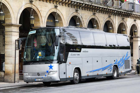 Paris, France - August 8, 2014: Touristic coach bus Ernst Auwaerter Eurostar SHD in the city street.のeditorial素材
