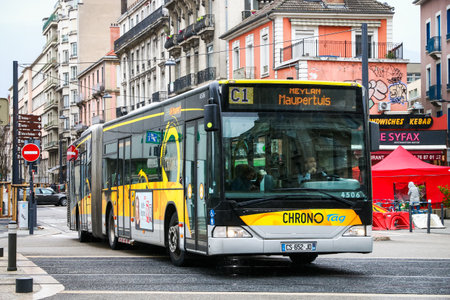 Grenoble, France - March 14, 2019: Articulated city bus Mercedes-Benz O530 Citaro G in the city street.のeditorial素材