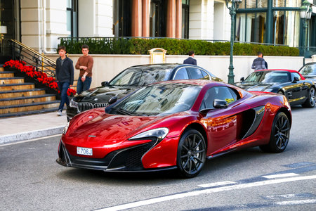 Monte-Carlo, Monaco - March 12, 2019: Red supercar McLaren 650S in the city street near the casino.