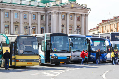Saint Petersburg, Russia - May 25, 2013: City sightseeing coach buses' parking near the Saint Isaac's Square - popular landmark of the city.のeditorial素材