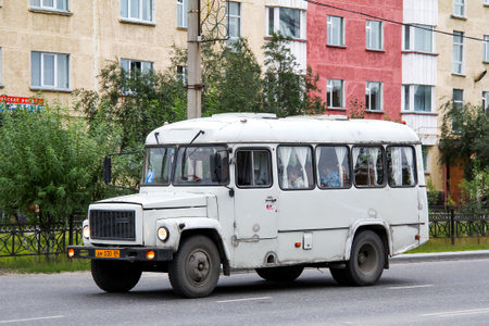 Novyy Urengoy, Russia - August 8, 2012: Old suburban bus KAvZ 3976 in the city street.のeditorial素材