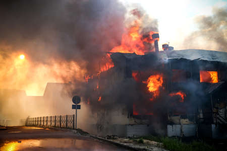 Fire in the old wooden houseの写真素材