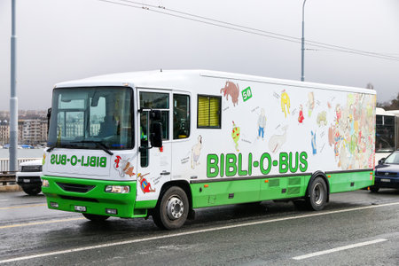 Geneva, Switzerland - March 13, 2019: White Bibli-O-Bus in the city street.のeditorial素材