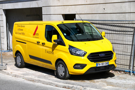 Saint-Tropez, France - September 11, 2019: Cargo van Ford Transit in the city street.