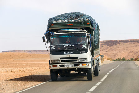 Khenifra Province, Morocco - September 27, 2019: White truck Isuzu FTR at the interurban road.のeditorial素材