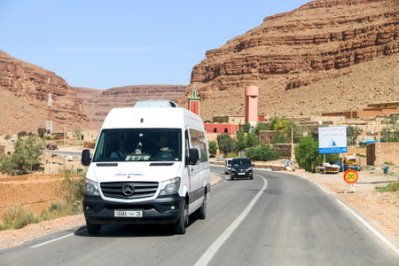 Khenifra Province, Morocco - September 27, 2019: White passenger van Mercedes-Benz Sprinter at the interurban road.のeditorial素材