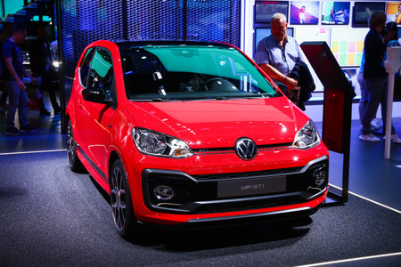 Photo pour Frankfurt am Main, Germany - September 17, 2019: Bright red supermini car Volkswagen Up! GTI presented at the Frankfurt International Motor Show IAA (Internationale Automobil Ausstellung) 2019. - image libre de droit