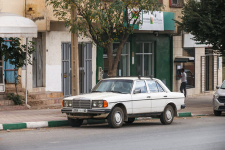Khenifra Province, Morocco - September 27, 2019: White motor car Mercedes-Benz E-class (W123) in the...