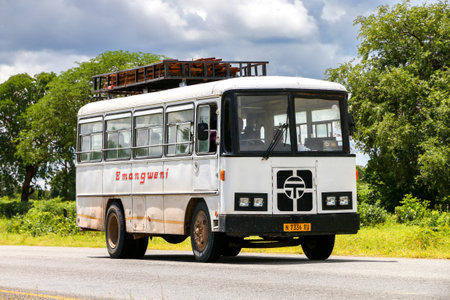 Rundu, Namibia - February 8, 2020: Old suburban bus at the interurban road.のeditorial素材