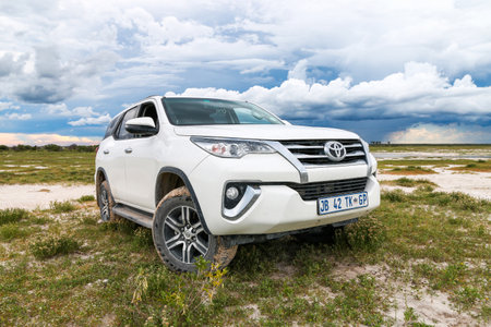 Etosha National Park, Namibia - February 7, 2020: Offroad car Toyota Fortuner in an African...