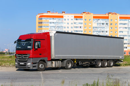 Novyy Urengoy, Russia - July 6, 2020: Semitrailer truck Mercedes-Benz Actros in the city street.のeditorial素材