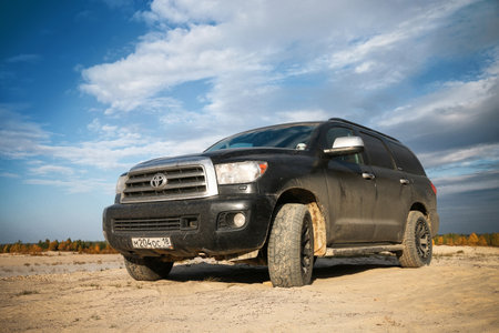 Novyy Urengoy, Russia - September 6, 2020: Black full-size SUV Toyota Sequoia (XK60) at the countryside.のeditorial素材