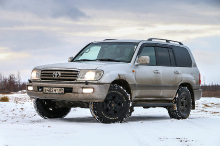 Novyy Urengoy, Russia - October 7, 2020: Offroad car Toyota Land Cruiser J100 at the snow covered...