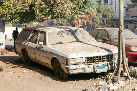 Giza, Egypt - January 26. 2021: Abandoned American car Chevrolet Caprice Estate in the city street.のeditorial素材