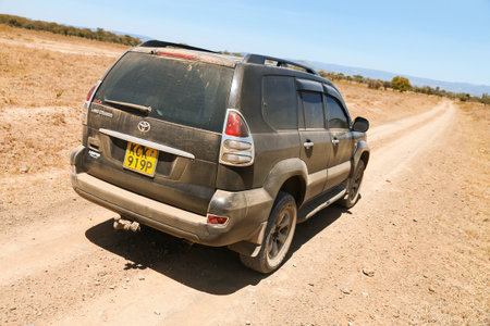 Lake Nakuru National Park, Kenya - February 1, 2021: Offroad car Toyota Land Cruiser Prado 120 at...