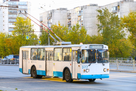 Ekaterinburg, Russia - September 13, 2021: Old white trolleybus ZiU 682G in a city street.のeditorial素材