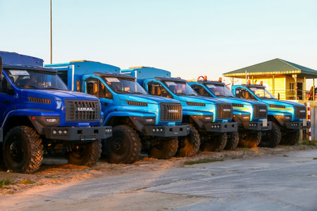 Novyy Urengoy, Russia - July 18, 2021: Brand new offroad trucks and buses Ural Next in a city street.のeditorial素材