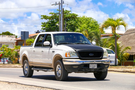 Tulum, Mexico - May 17, 2017: White pickup truck Ford Lobo in a city street.