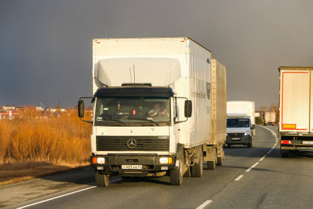 Sverdlovsk Oblast, Russia - October 26, 2021: White truck Mercedes-Benz LN 1320 at an intercity road.のeditorial素材