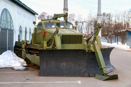 Moscow, Russia - March 6, 2022: Soviet and Russia military engineering vehicle BAT-M in the...