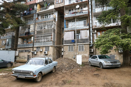 Tbilisi, Georgia - October 10, 2021: Soviet saloon car GAZ 24 Volga in a yard.のeditorial素材