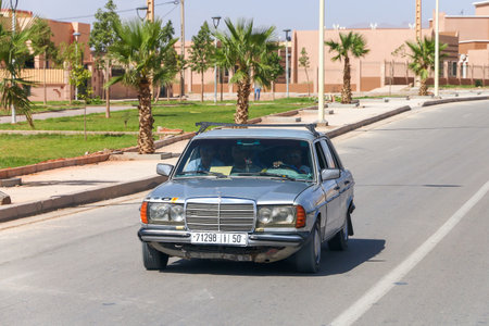 Khenifra Province, Morocco - September 27, 2019: Old German car Mercedes-Benz E-class (W123) in a city street.のeditorial素材